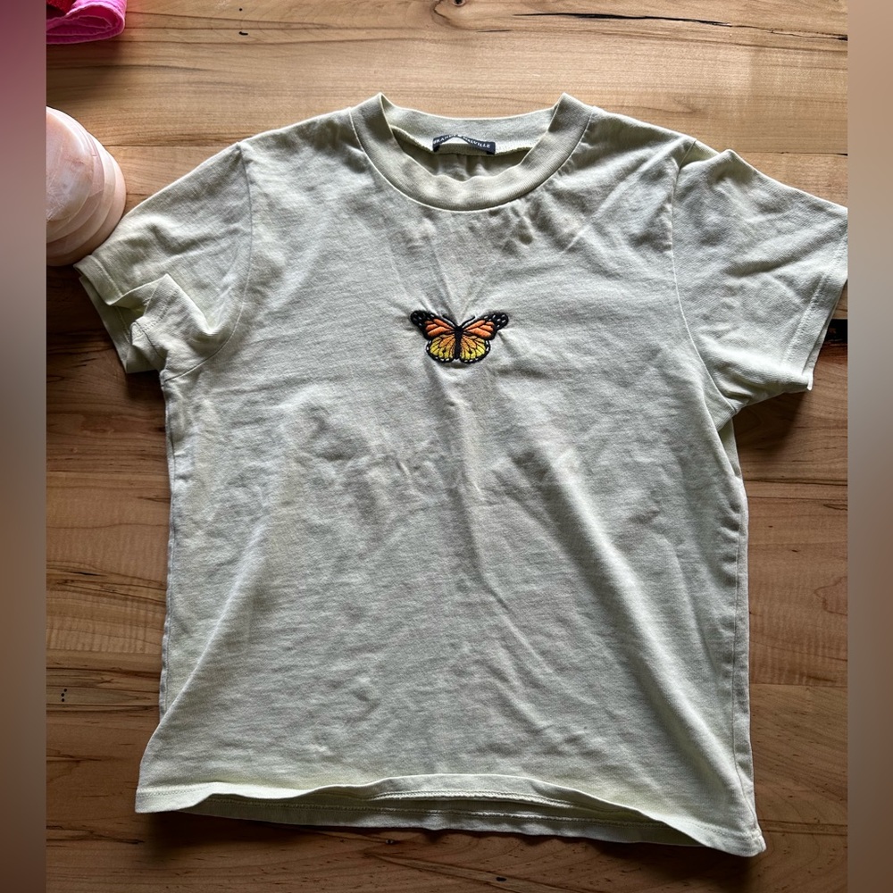 Butterfly logo T-shirt, size small, 100% cotton